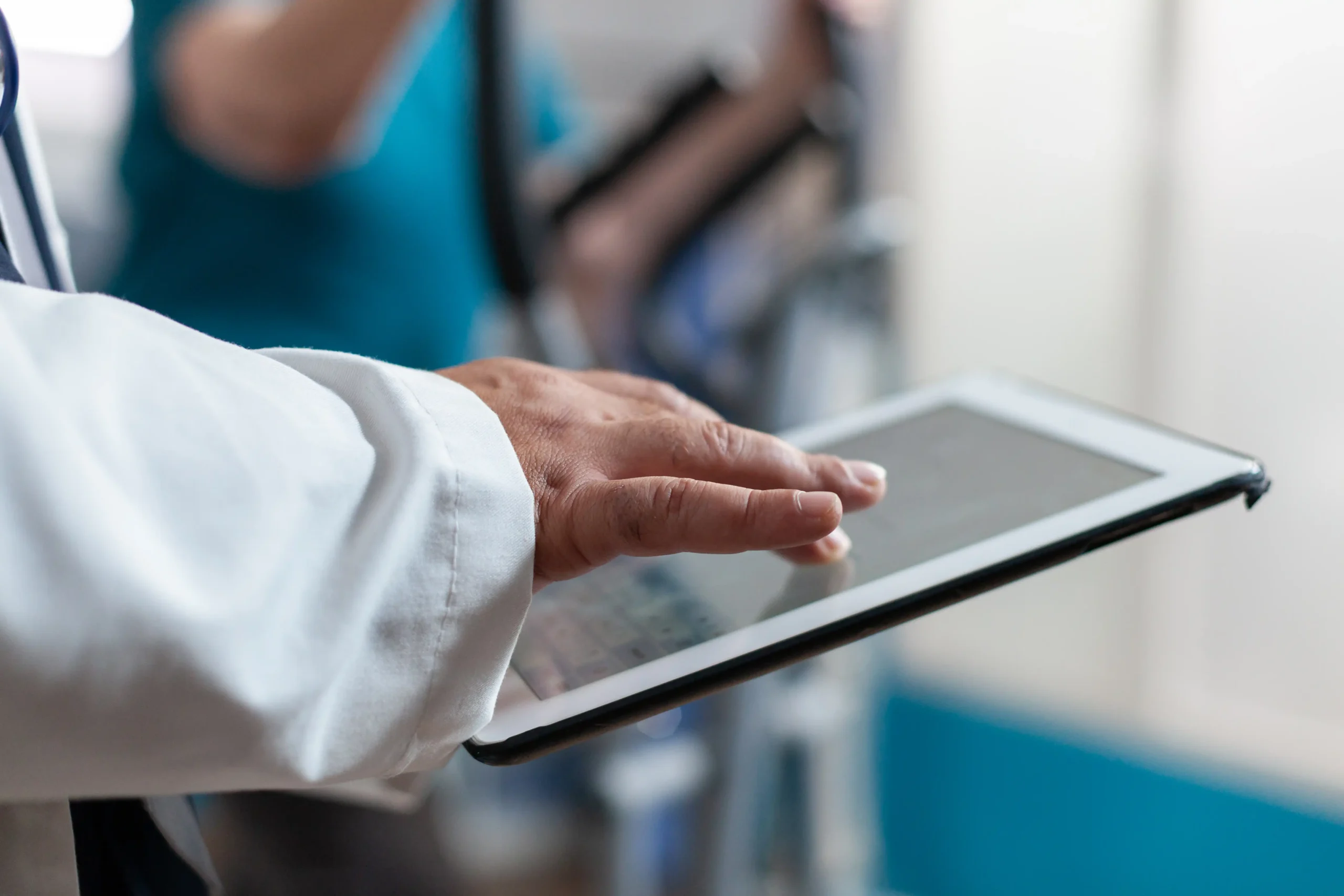Doctor using EMR software to access electronic health records