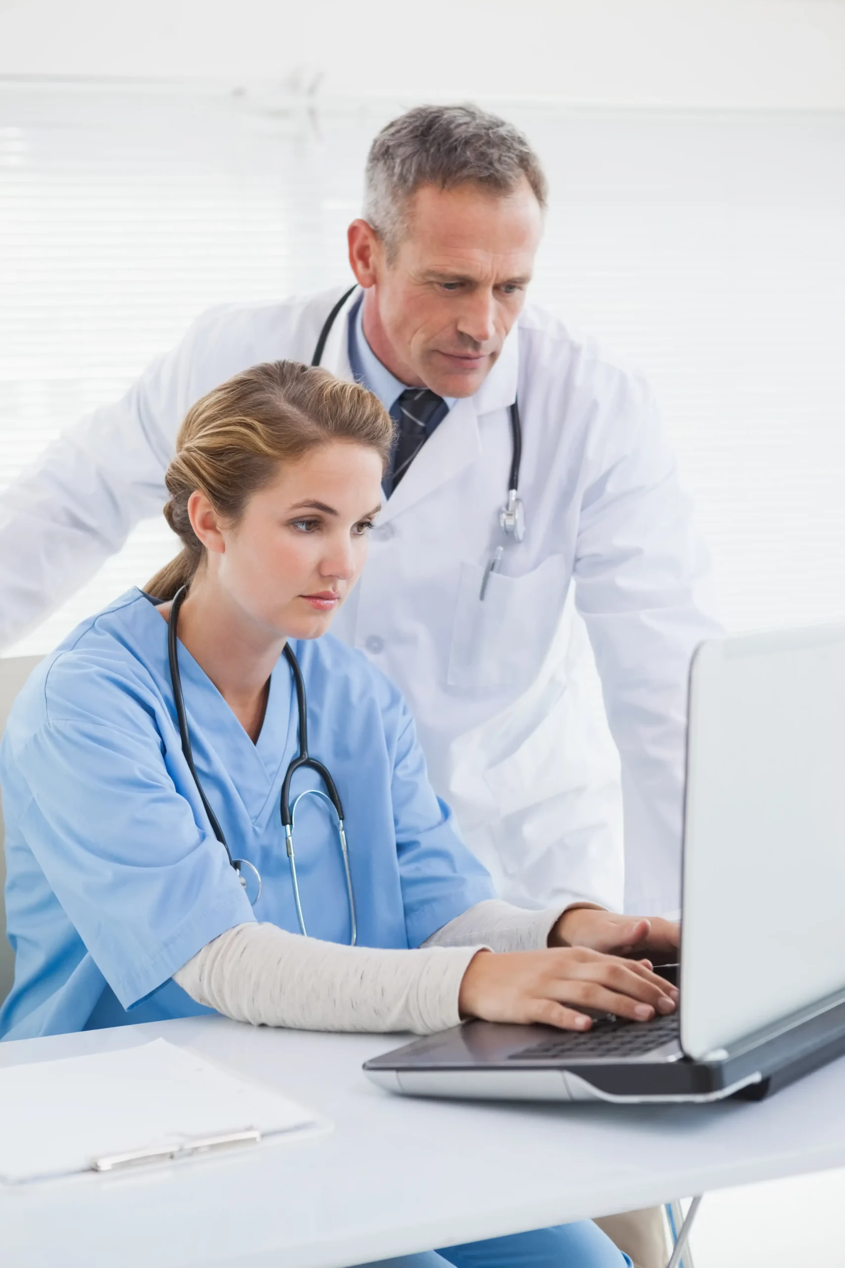 Medical billing expert reviewing patient claims and insurance data
